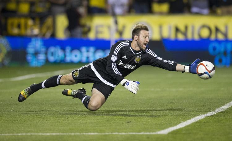 Apr 18, 2015; Columbus, OH, USA; Columbus Crew SC goalkeeper Steve Clark (1) chases after a loose ball in the game against Orlando City FC at MAPFRE Stadium. Columbus won the game 3-0. Mandatory Credit: Greg Bartram-USA TODAY Sport