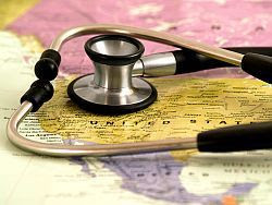 photo of a us map with a stethoscope lying on top of it