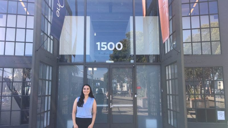 Maya Ahmed '20 in front of MKThink, an architecture firm founded by Mark Miller '84.