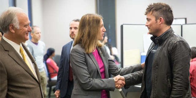 John Pointer meets HHS Secretary Burwell during a visit to the Health Alliance for Austin Musicians (HAAM) at Foundation Communities in Austin, Texas on December 13, 2015.