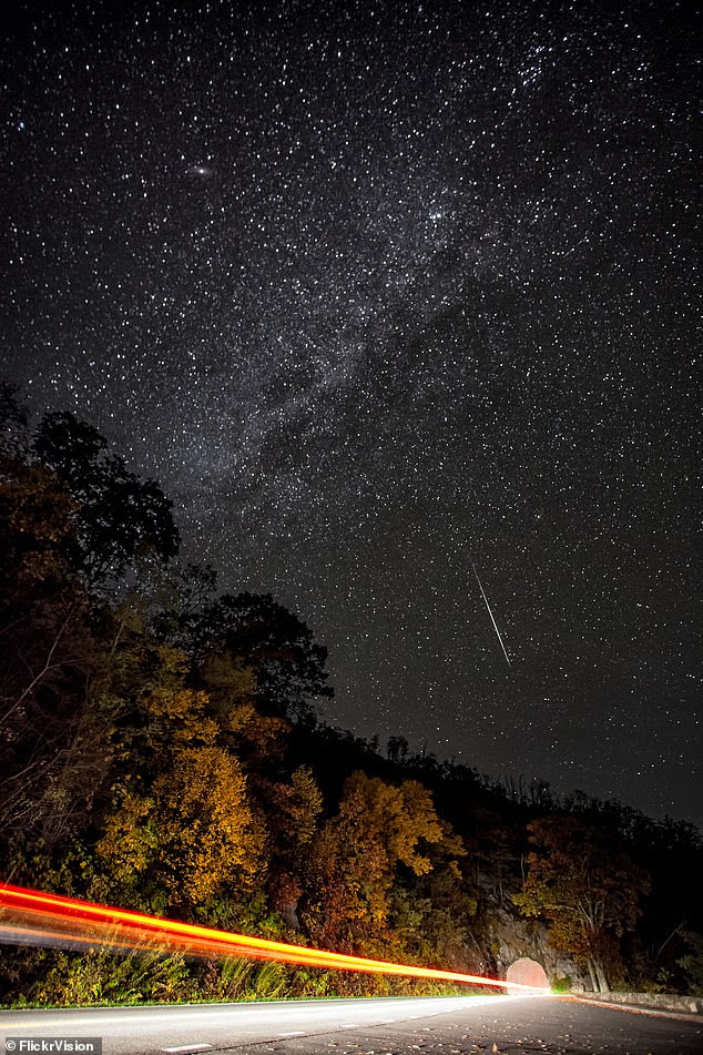 Stargazers are in for a treat this month when hundreds of shooting stars light up the sky during an Orionid meteor shower. Pictured is the event in 2012