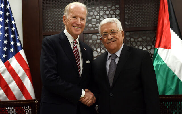 Then-US vice president Joe Biden, left, and Palestinian President Mahmoud Abbas, right, at the presidential compound in Ramallah, West Bank, March 9, 2016. (Debbie Hill, Pool via AP)