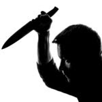 Horror-silhouette-of-man-with-knife