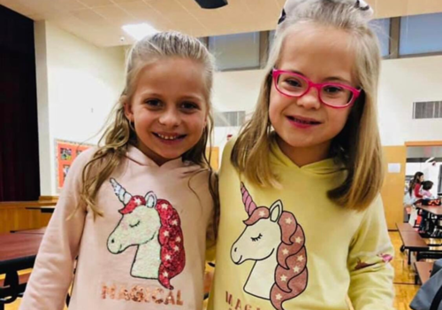 Sarah Basile's daughter, right, has Down syndrome. She Is pictured here with a friend.