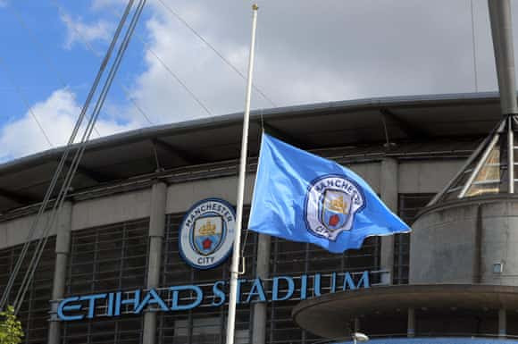 And a City flag flies at half mast outside the Etihad Stadium, which is being used as a support centre following the attack.