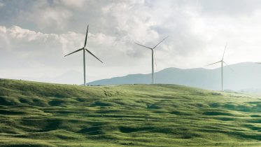 Wind Turbines on Green Hillside