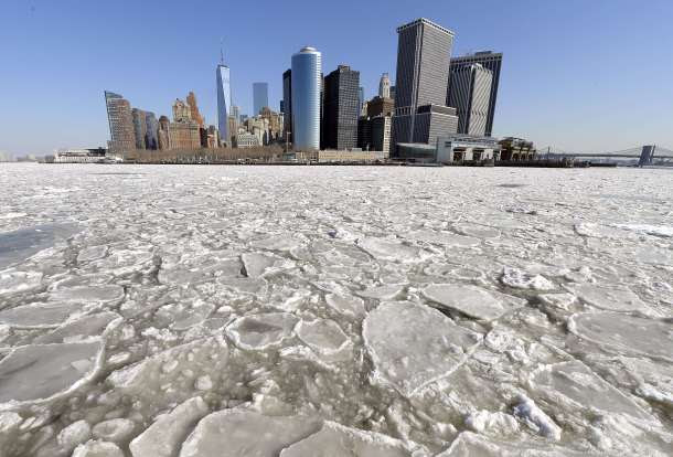 -- AFP PICTURES OF THE YEAR 2015 -- A view of Lower Manhattan from the Staten Island Ferry February 25, 2015 as the New York Harbor is filled with large chunks of ice. Heavy ice in the East River shut down commuter ferry service on Tuesday morning stopping travel between Manhattan, Queens, and Brooklyn. AFP PHOTO / TIMOTHY A. CLARY