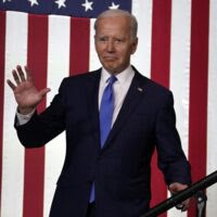 Joe Biden leaves during deadly winter crisis