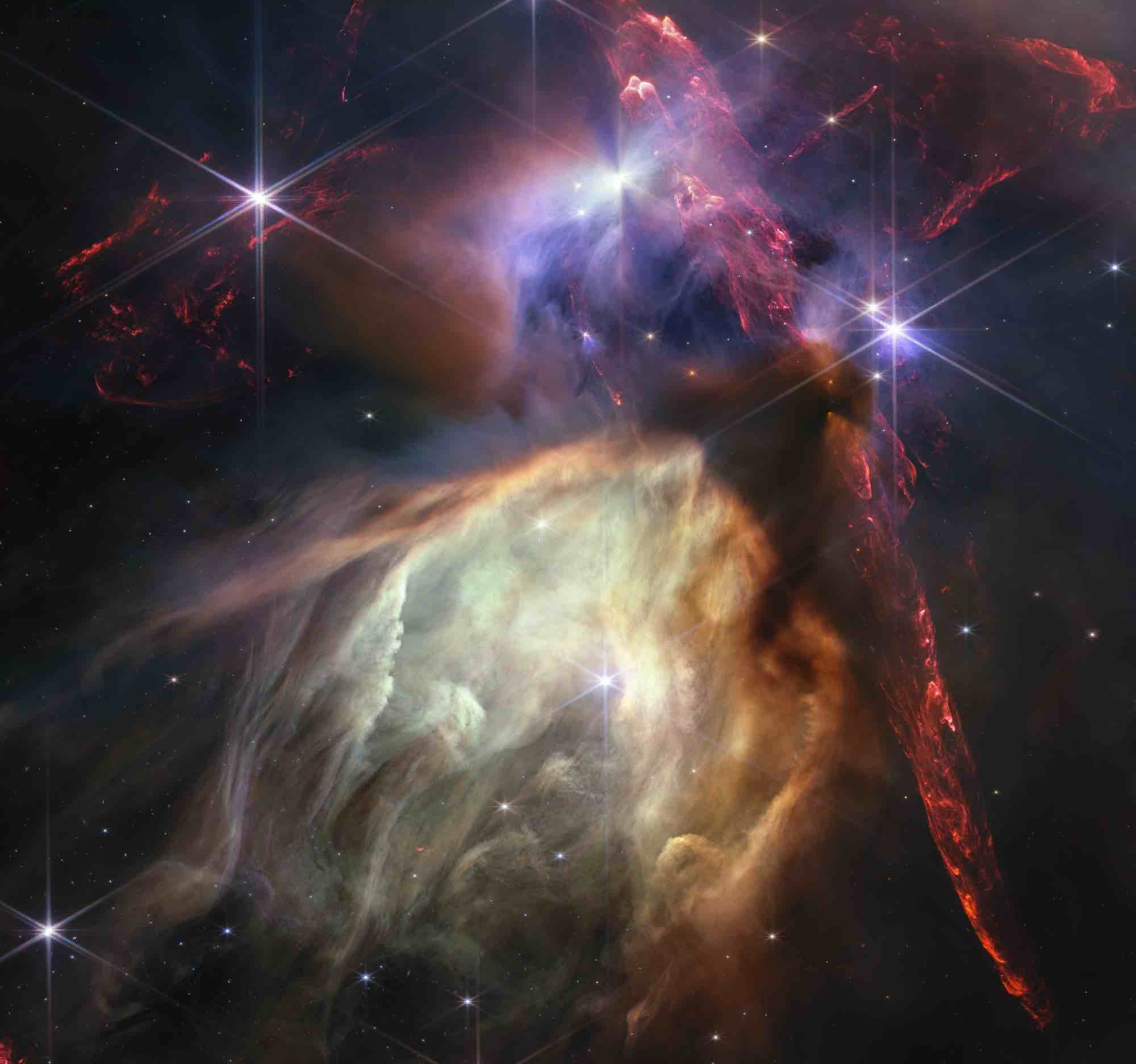 an image of stars being born in space.