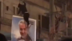 Video: Iranian protesters tear down poster of Soleimani