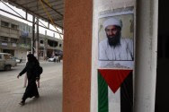 Photo of Al Qaeda founder and former leader, Osama Bin Laden, seen above a Palestinian Authority flag in Gaza.