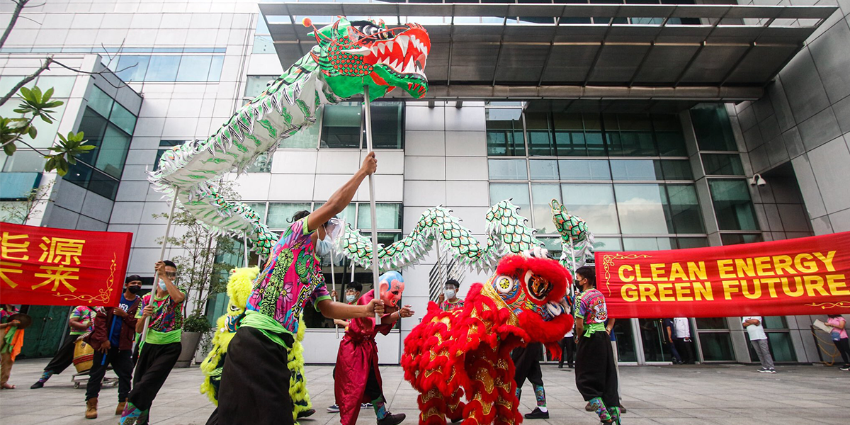 Climate advocates from 350 Pilipinas held a dragon and lion dance at the Chinese Embassy in Makati, Metro Manila. 