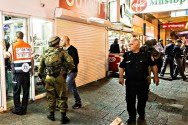 Israeli security forces at the scene of a stabbing attack in the northern city of Nahariya Friday night.