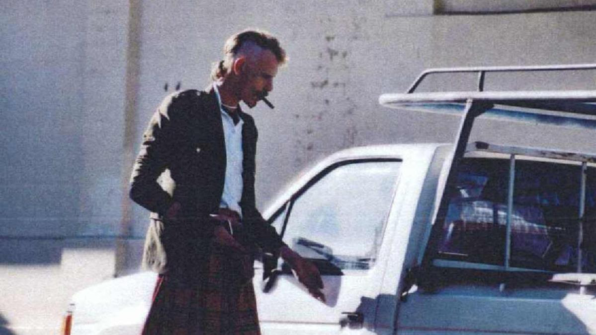 Surveillance photos of Andrew Mallard with shaved head and tartan kilt in June 1994