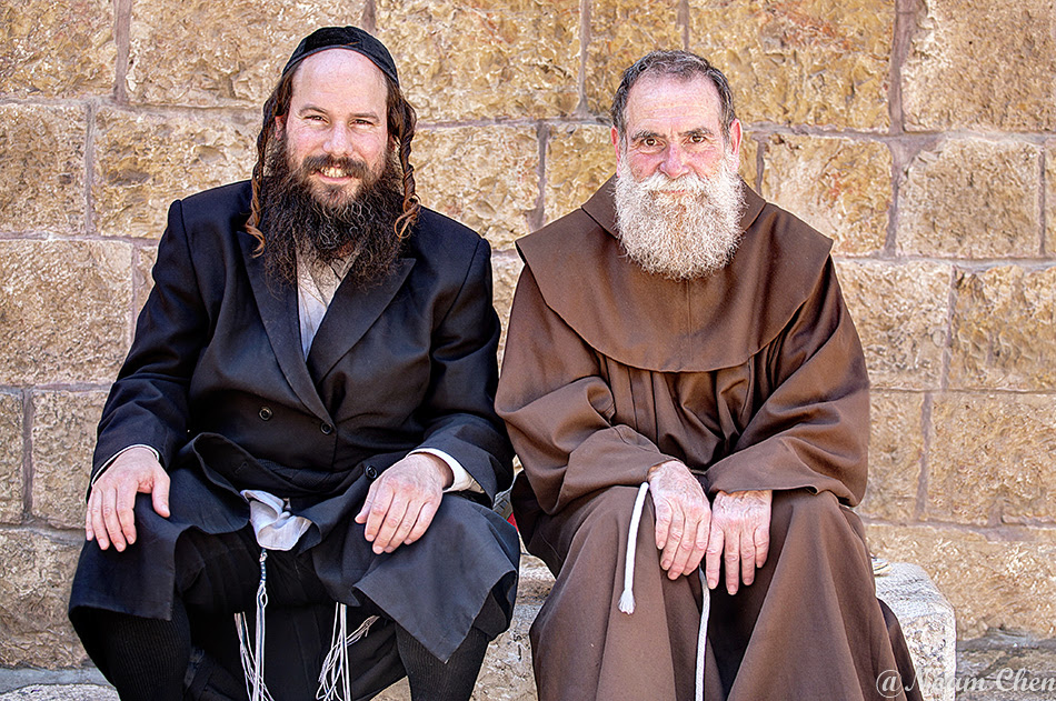a jew and a christian sitting together in the old city of jerusalem israel