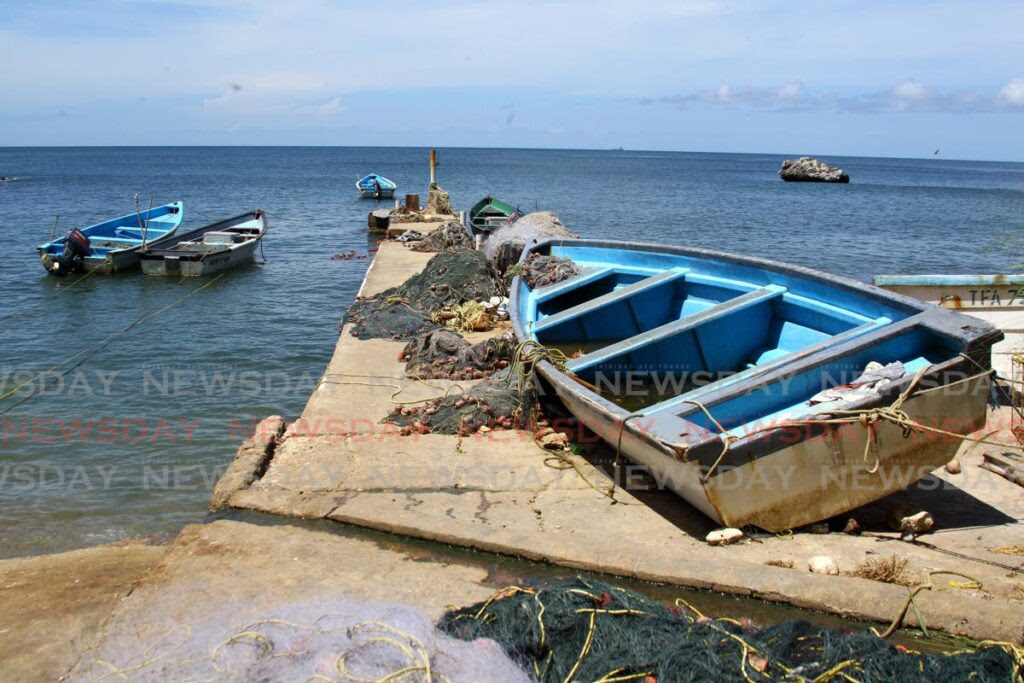 In this file photo, fishing boats are moored at the site of the proposed Toco Port. - ROGER JACOB