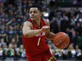 Maryland guard Anthony Cowan Jr. plays against Michigan State in the first half of an NCAA college basketball game in East Lansing, Mich., Saturday, Feb. 15, 2020. (AP Photo/Paul Sancya) ** FILE **