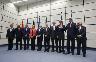 Delegates from Iran and a group of six nations led by the United States in Vienna on Tuesday after reaching an accord.   Credit Carlos Barria/Agence France-Presse — Getty Images  (NYT)