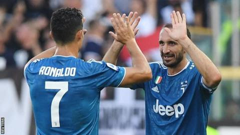 Giorgio Chiellini celebrates scoring with Cristiano Ronaldo