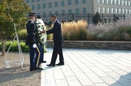 President Barack Obama places a wreath at the dateline of the Pentagon 9/11 Memorial