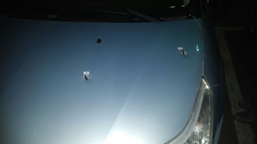Bullet holes in car - Dec. 14, 2016