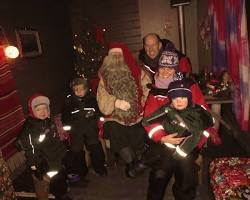 family enjoying a Christmas feast in Lapland