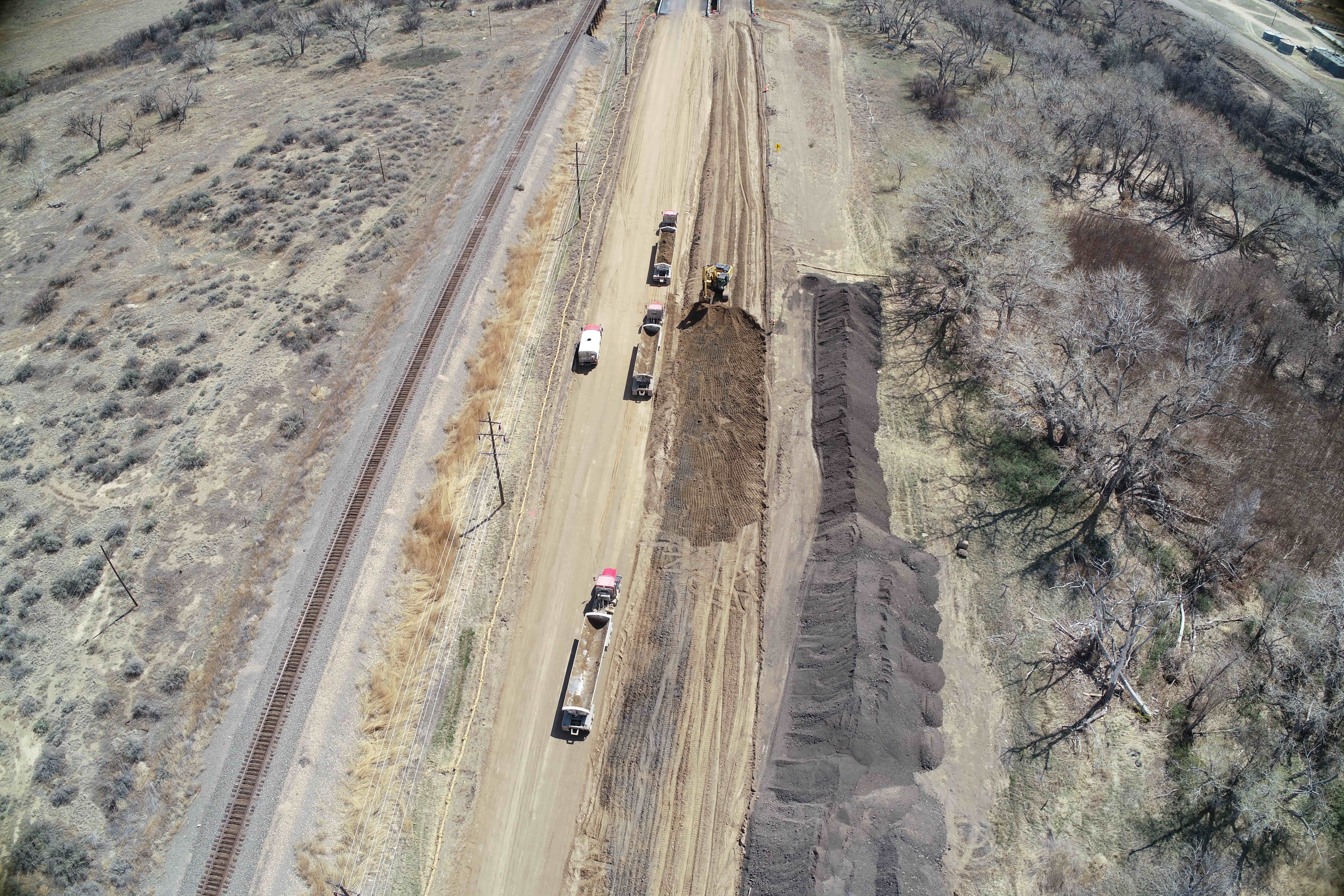 Ariel view of trucks and crews milling on US 50
