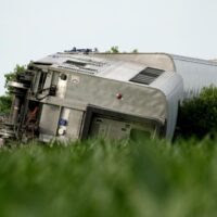 Dump truck collision: Amtrak derailment kills 3 and injures dozens