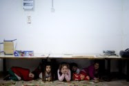Israeli children taking cover during rocket attack